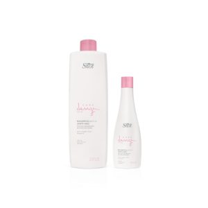 CHAMPÚ ANTIEDAD-REGENERANTE: reestructurante y regenerante para cabellos desfibrados, maltratados y estresados. MODO DE USO: aplicar sobre el cabello húmedo, masajear y después de 2 minutos enjuagar. Envase: Frasco 1000 ml y 250 ml.